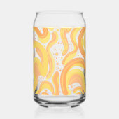 オレンジと黄色の渦巻き形にドットが付いている ガラス缶 (左)