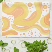 オレンジと黄色の渦巻き形にドットが付いている キッチンタオル (折り畳み)