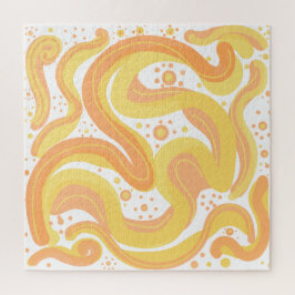オレンジと黄色の渦巻き形にドットが付いている ジグソーパズル
