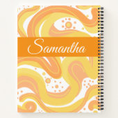オレンジと黄色の渦巻き形にドットが付いている ノートブック (裏面)