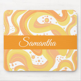 オレンジと黄色の渦巻き形にドットが付いている マウスパッド