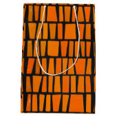 オレンジと黒のアフリカの部族パターン ミディアムペーパーバッグ (裏面)