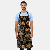 オレンジと黒のクロスランチョンマット エプロン (着用した状態)