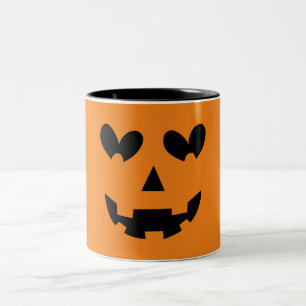オレンジと黒のハッピーなハートのかぼちゃのハロウィン ツートーンマグカップ