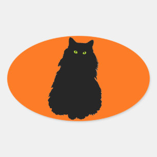 オレンジに黒いシルエットで座る 楕円形シール