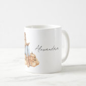 オレンジのかぼちゃと本を持つ女の子 コーヒーマグカップ (正面右)