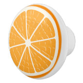 オレンジのスタイル化したフルーツスライス セラミックノブ (右)