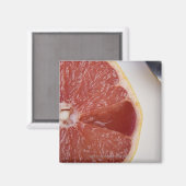 オレンジのスライスとスプーンのクローズアップ マグネット (正面/裏面)