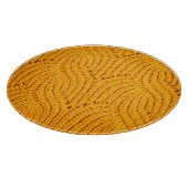 オレンジのニットのセーター、テクスチャ付きの背景。 カッティングボード (角)