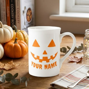 オレンジのパンプキンに名前入りハロウィンデザイン ボーンチャイナマグカップ