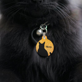 オレンジのラメの派手な背景に黒猫のシルエット ペット　ネームタグ