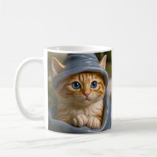 オレンジの子猫の魔法使い コーヒーマグカップ (左)