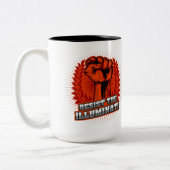 オレンジの拳を上げてイルミナティに抵抗する ツートーンマグカップ (左)