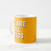 オレンジの陶器のマグカップ - "We Are All Mugs" コーヒーマグカップ (正面左)