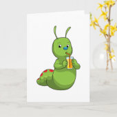 オレンジジュースのグラスを持つイモムシ カード (黄色い花)