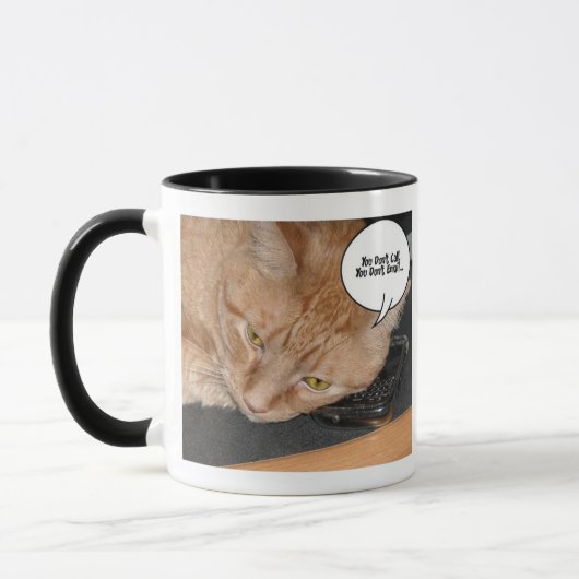 オレンジテビ猫のユーモア マグカップ (左)