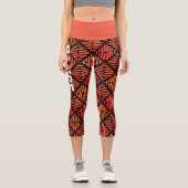 オレンジパーソナライズされた色と黒の幾何学的 カプリレギンス (正面)