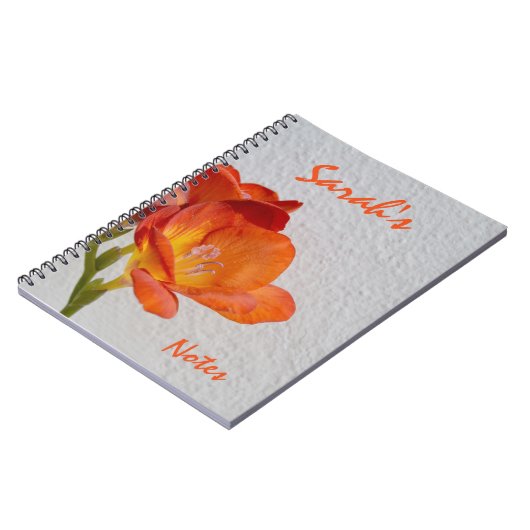オレンジフレシパーソナライズされたアノート ノートブック (左側)