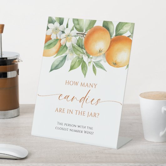 オレンジフローラ瓶の中にキャンディーが何個入っているか 台座サイン (インサイチュ)