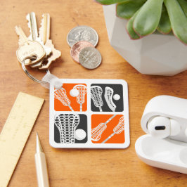 オレンジラクロスの棒とボールのブロック キーホルダー