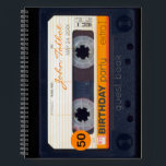 オレンジレトロAudiotape 50th birthday Guest Book 2 ノートブック<br><div class="desc">古いオーディオカセットあなたの名前、日付と引用文（背面）でパーソナライズする。デザインスパイラルノート（ゲストブックとして）の文字50th誕生日パーティー用。一致する誕生日は、日付のマグネットとハガキ、誕生日の招待状、誕生日紙ナプキンとゲストブック(懸命カバー)。レトロ忘れなオーディオタップ(透明、緑の色、デカールなど)のコレクション全体を行わない…</div>