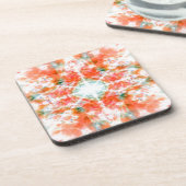 オレンジ万華鏡のように千変万化するパターン コースター (左側)