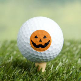 オレンジ不気味色の黒いハロウィーンのカボチャのちょうちんおかしなハロウィーン ゴルフボール