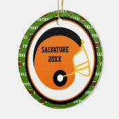 オレンジ及び黒いフットボール用ヘルメットのクリスマスのオーナメント セラミックオーナメント (左)