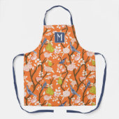 オレンジ色と青のチノワズリーの鳥のモノグラム エプロン (正面)