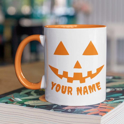 オレンジ色のかぼちゃにハロウィーンの名前を入れよう マグカップ