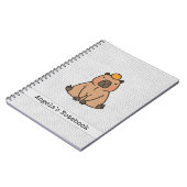 オレンジ色のかわいいカピバラ ノートブック (左側)