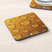 オレンジ色のウォータードロップテクスチャ コースター (左側)