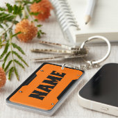 オレンジ色のカスタマイズ可能な名前ライセンスプレート キーホルダー (正面右)