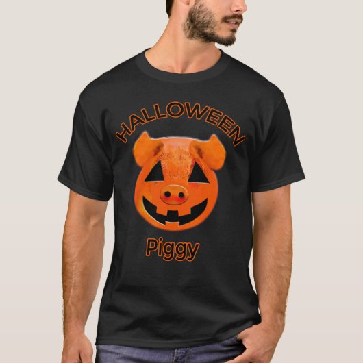 オレンジ色のカボチャの顔のハロウィンピギー Tシャツ (正面)