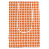 オレンジ色のギンガムのデイジーでゴールデンレトリバー ミディアムペーパーバッグ (裏面)