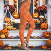 オレンジ色のクモの巣パターンハロウィン レギンス