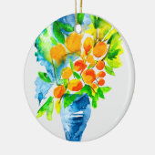 オレンジ色のクンクアットフルーツアートの水色 セラミックオーナメント (左)