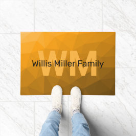 オレンジ色のグラデーションジオメトリメッシュパターンモノグラム ドアマット