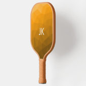 オレンジ色のグラデーションジオメトリメッシュパターンモノグラム ピックルボールラケット (左)