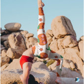 オレンジ色のグリーンかわいい微笑みカボチャのパターン レギンス