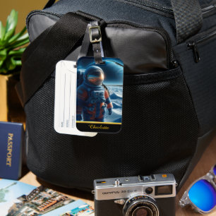 オレンジ色のスーツ鮮やかを着た宇宙飛行士 ラゲッジタグ