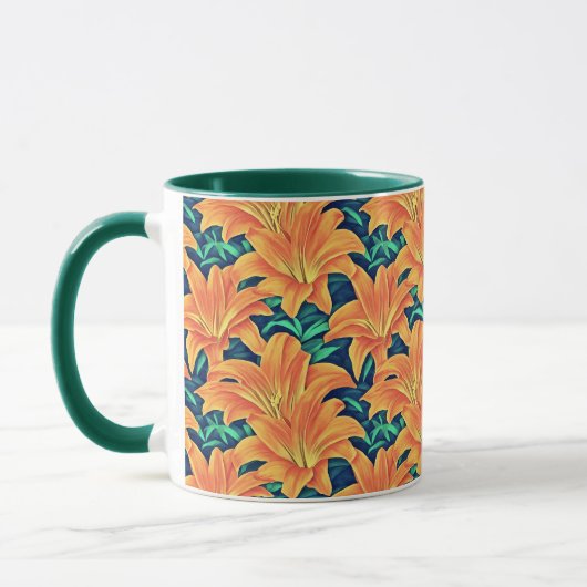 オレンジ色のデイリリーと緑離れの マグカップ (左)