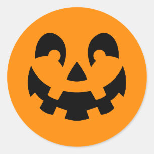 オレンジ色のハロウィンにシンプルな黒いカボチャの顔 ラウンドシール
