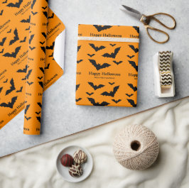 オレンジ色のハロウィンにシンプルな黒いコウモリのシルエット ラッピングペーパー