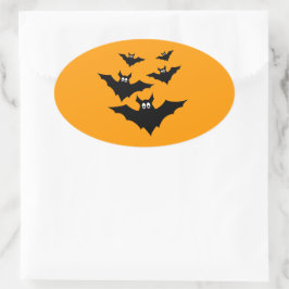 オレンジ色のハロウィンのかわいい黒いコウモリ 楕円形シール