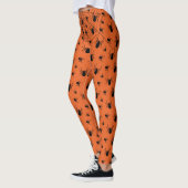 オレンジ色のハロウィンコスチューム 黒クモのクモの巣 レギンス (左)