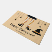 オレンジ色のハロウィーンの魔女の脚と名前のクモ ドアマット (アングル)