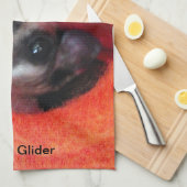 オレンジ色のハンモックにいるフクロモモンガ キッチンタオル (四つ折り)