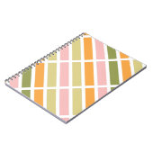 オレンジ色のピンク金ゴールドと緑のストライプ ノートブック (左側)