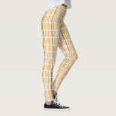 オレンジ色のピンク金ゴールドと緑のストライプ レギンス (右)